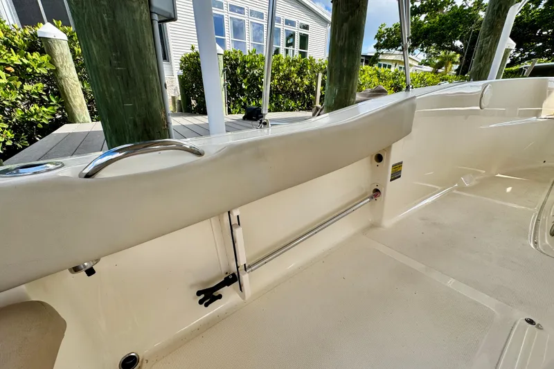 Slide: The Image of 2024 Scout 195 Sportfish boat interior with sleek design and stainless steel features. - 20