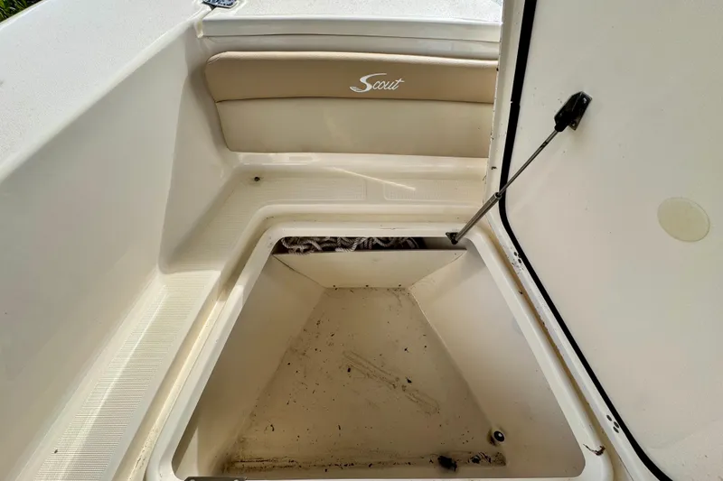 Slide: The Image of Open storage compartment on 2024 Scout 195 Sportfish boat, showcasing interior space. - 41