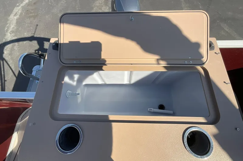 Slide: The Image of Open storage compartment on 2021 Sylvan Mirage Fish 820 Party Fish boat. - 12