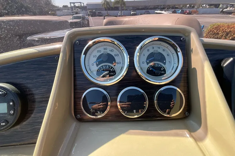 Slide: The Image of Dashboard of 2021 Sylvan Mirage Fish 820 Party Fish boat with gauges and controls. - 15