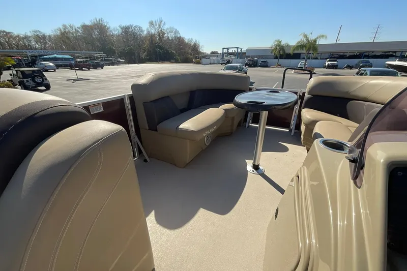 Slide: The Image of 2021 Sylvan Mirage Fish 820 Party Fish boat interior with seating and table. - 18