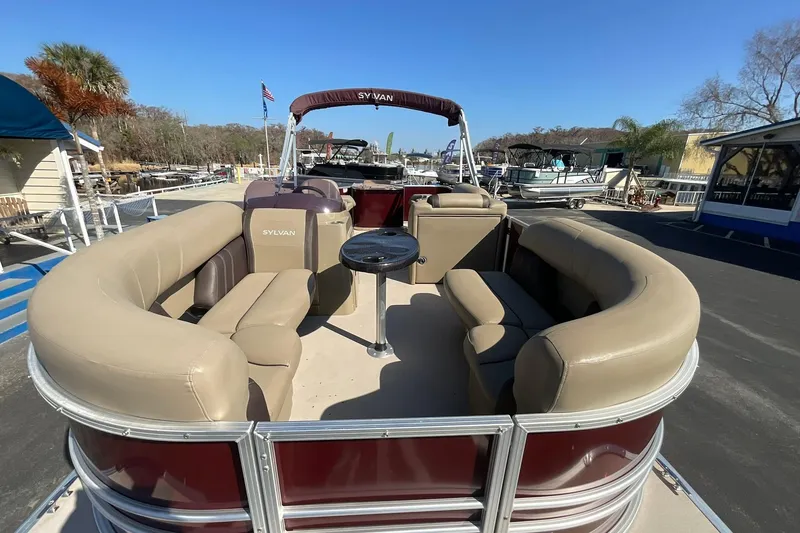 Slide: The Image of 2021 Sylvan Mirage Fish 820 Party Fish pontoon boat with spacious seating and table. - 8