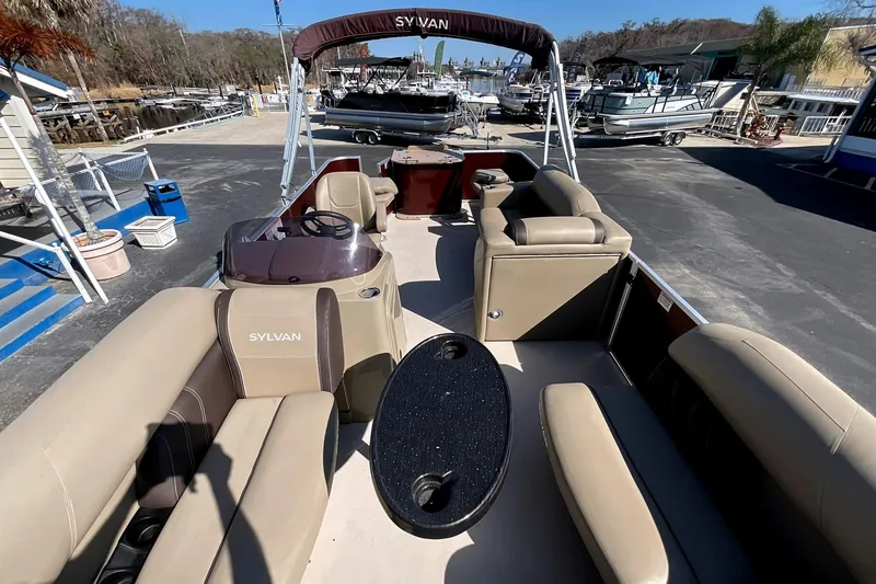 Slide: The Image of 2021 Sylvan Mirage Fish 820 Party Fish pontoon boat at dock. - 9