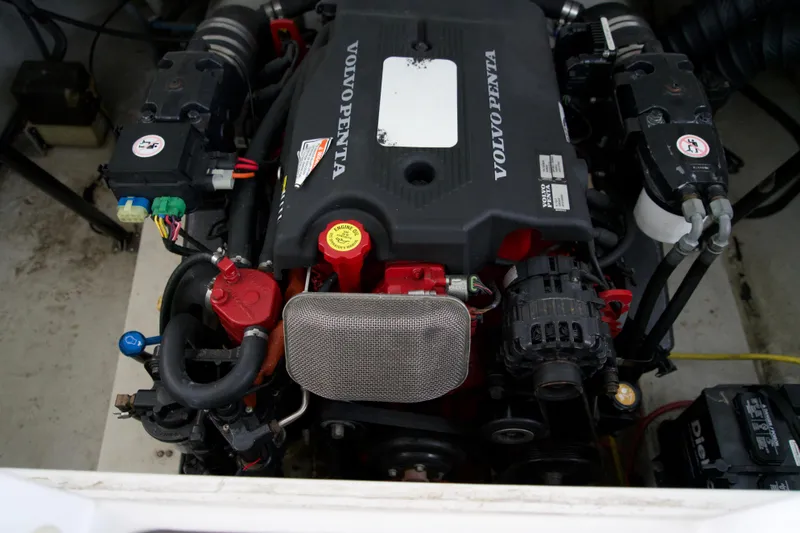Slide: The Image of Volvo Penta engine in a 2005 Cobalt 262 boat, detailed view. - 14
