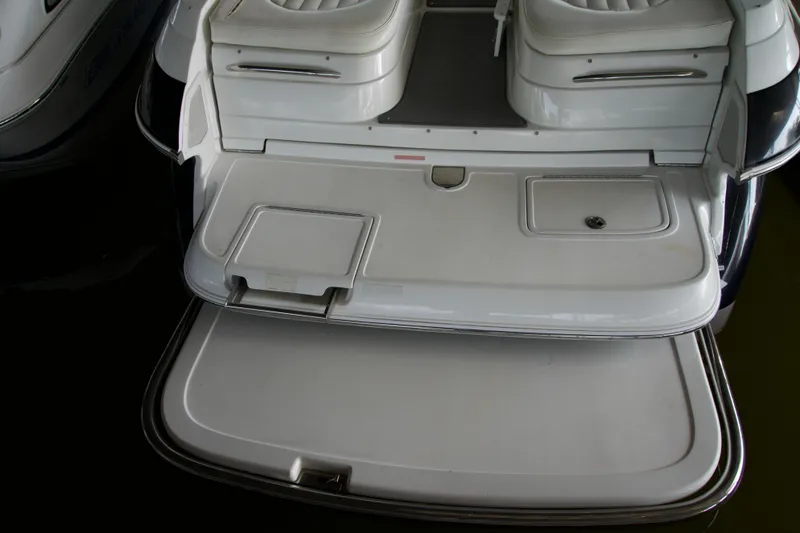 Slide: The Image of Rear view of a 2005 Cobalt 262 boat with swim platform and seating. - 7
