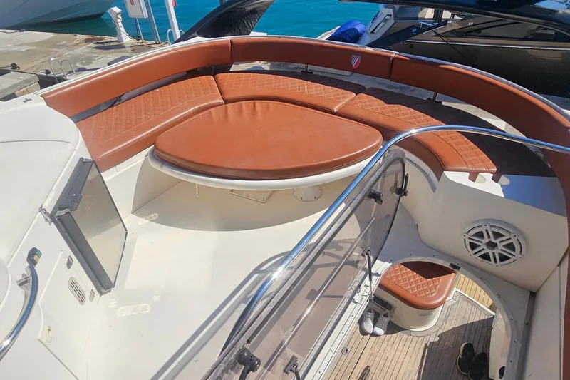 Slide: The Image of Luxurious 2006 Fairline 50 yacht with elegant brown seating and sleek design. - 8