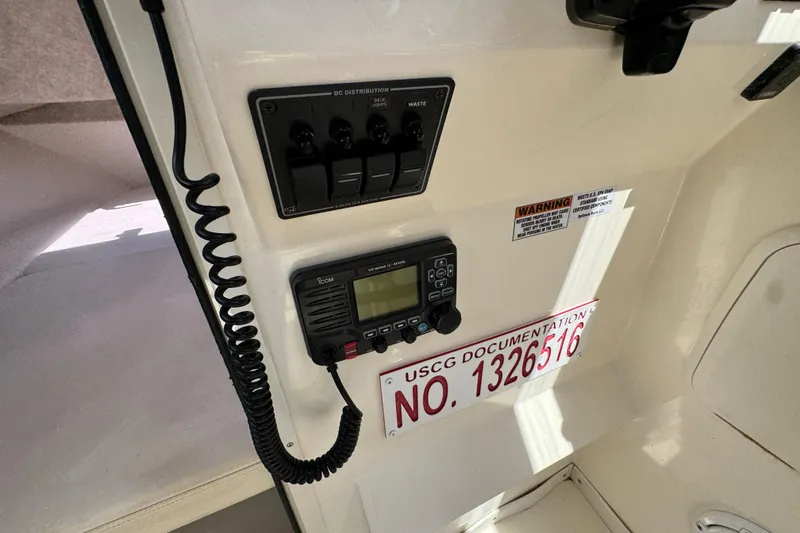 Slide: The Image of Interior of 2016 Defiance Admiral 270 EX with radio and control panel. - 24