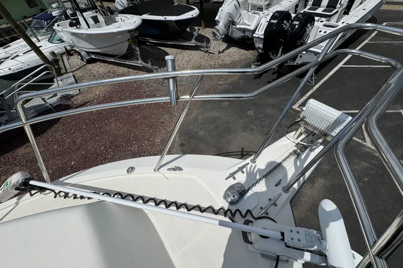 Slide: The Image of 2016 Defiance Admiral 270 EX boat deck with railing and anchor system. - 31