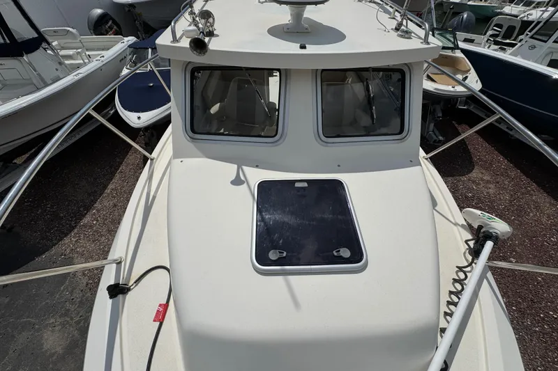 Slide: The Image of 2016 Defiance Admiral 270 EX boat deck with hatch and railing. - 33
