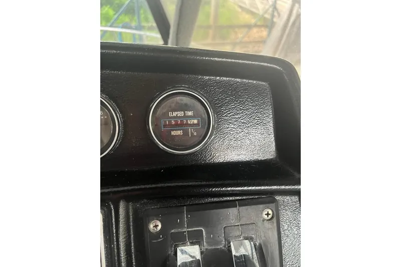 Slide: The Image of Instrument panel of a 1986 Carver 3297 Mariner showing elapsed time in hours. - 13