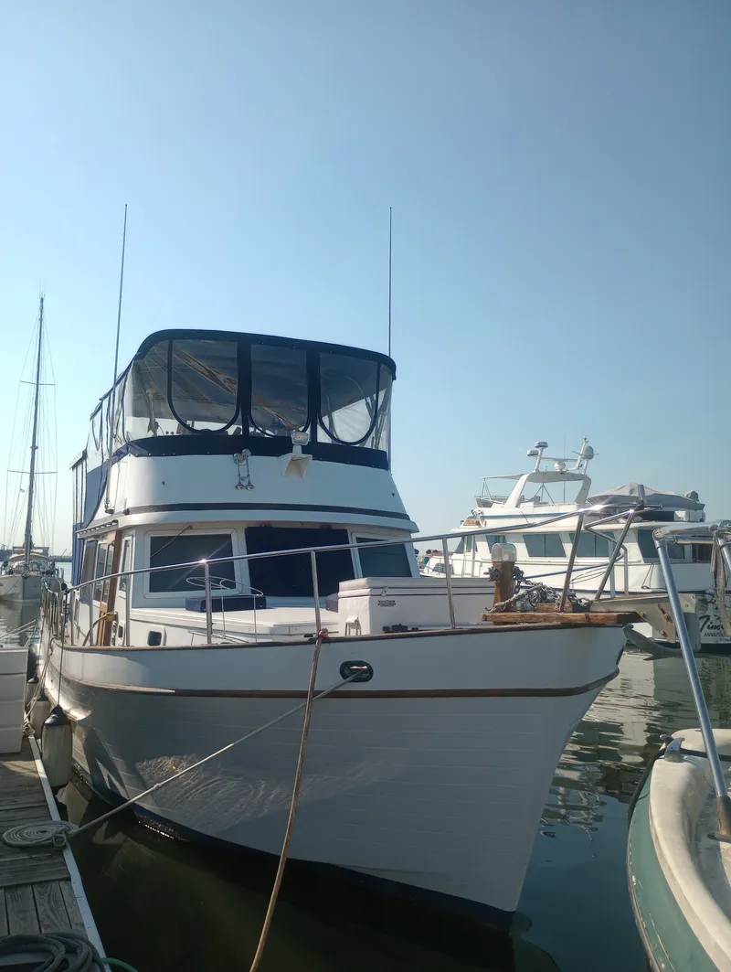 The Image of 1981 Marine Trading 44 Double Cabin docked at marina. - 0