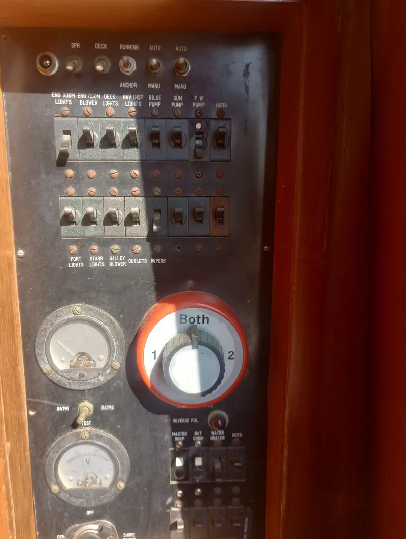 Slide: The Image of Control panel of a 1981 Marine Trading 44 Double Cabin yacht. - 26