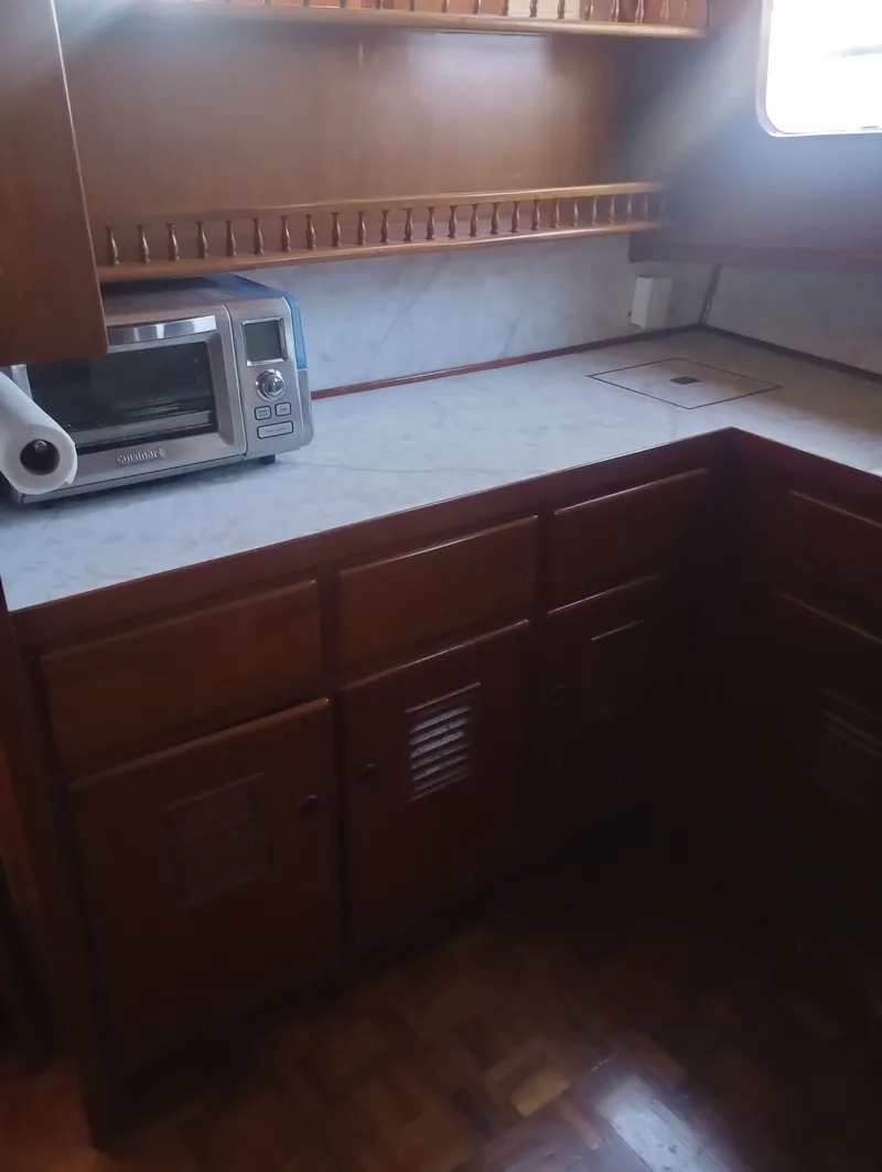 Slide: The Image of Kitchen area on Marine Trading 44 Double Cabin, year 1981. - 29