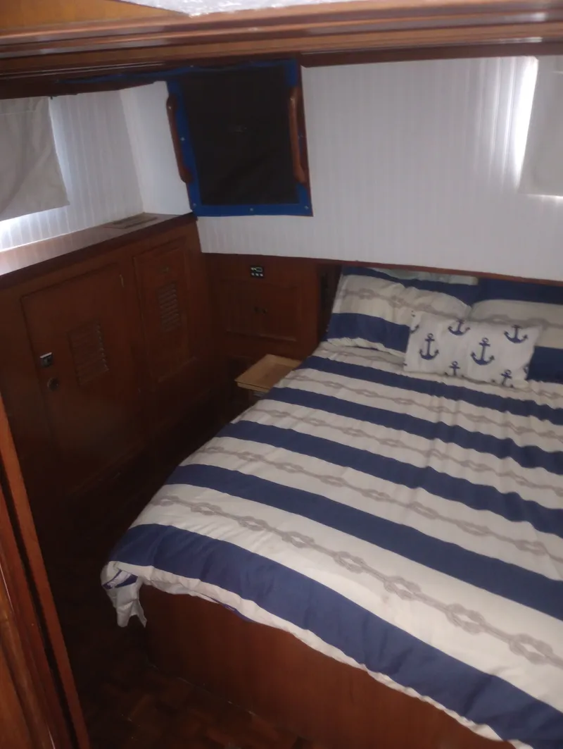 Slide: The Image of Interior of 1981 Marine Trading 44 Double Cabin, cozy bedroom. - 38