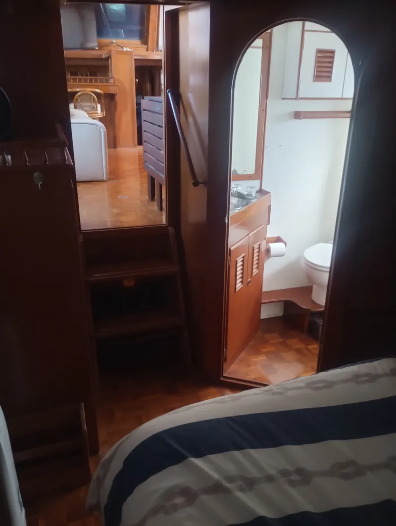Slide: The Image of Interior of 1981 Marine Trading 44 Double Cabin with bathroom and sleeping area. - 40