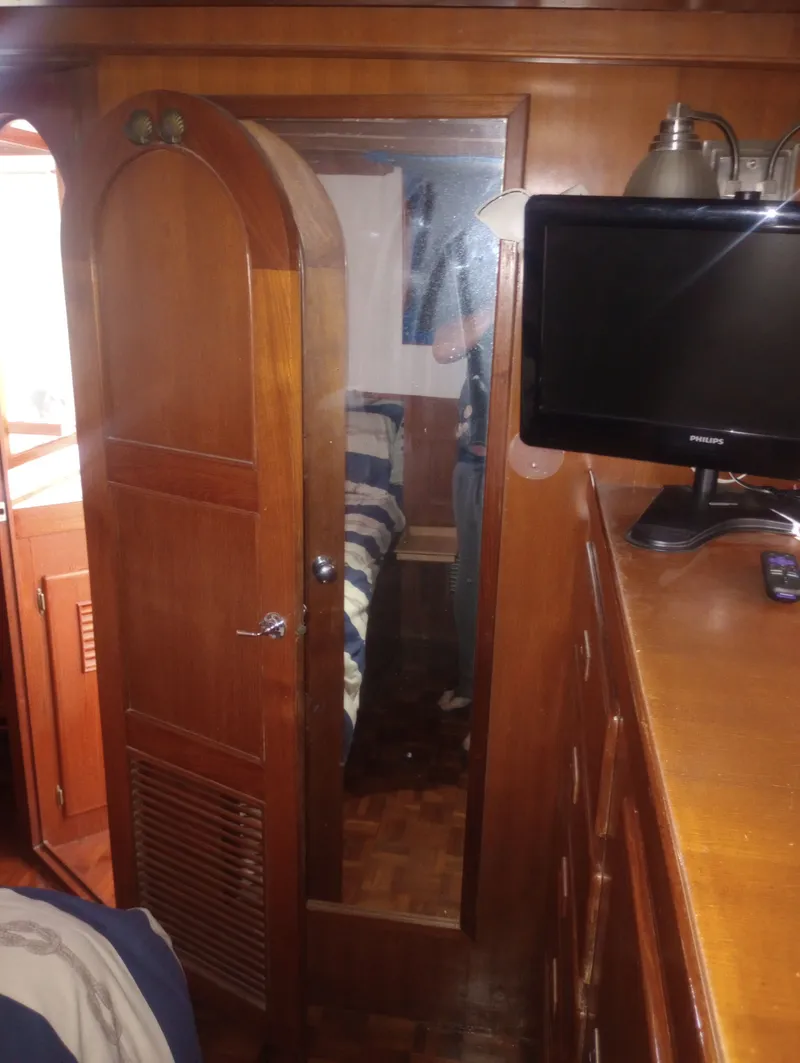 Slide: The Image of Interior of 1981 Marine Trading 44 Double Cabin with wooden furnishings. - 44