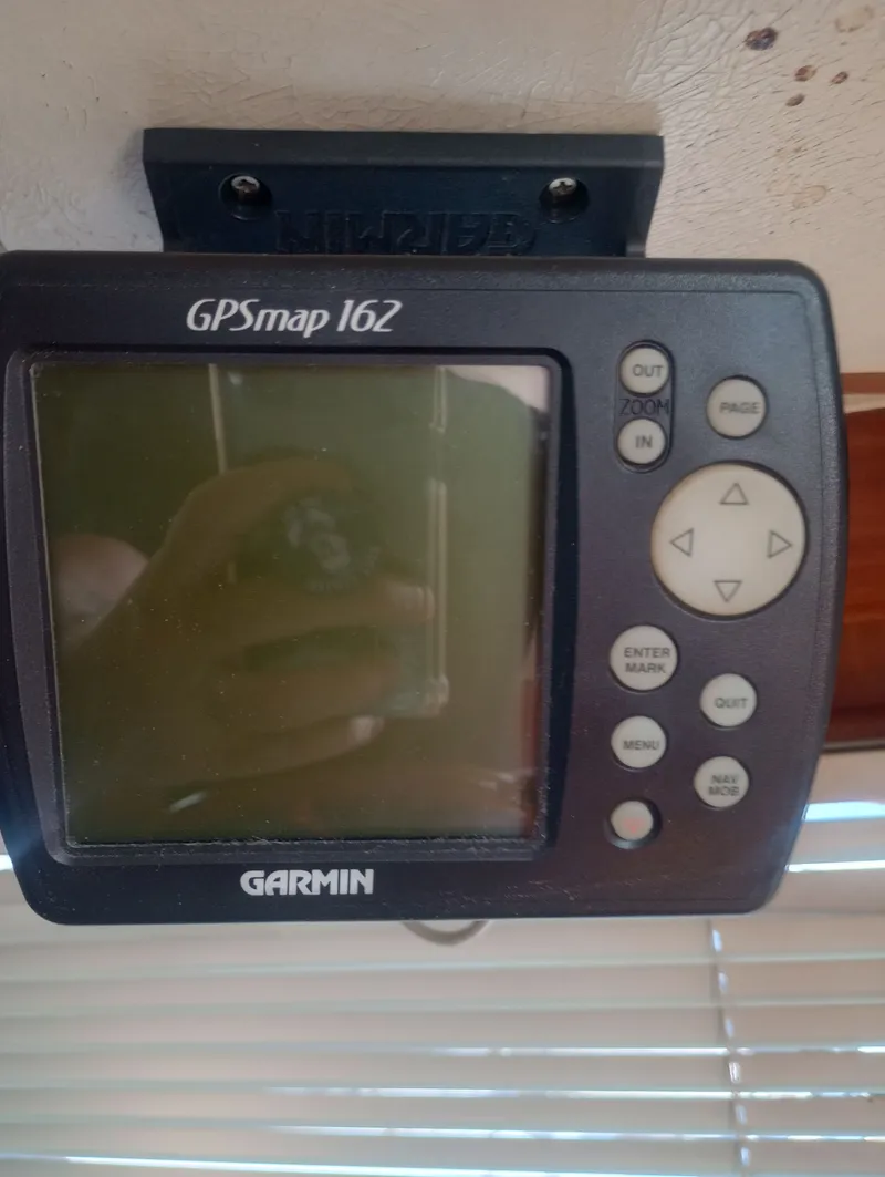 Slide: The Image of Garmin GPSmap 162 on Marine Trading 44 Double Cabin, 1981 model. - 46