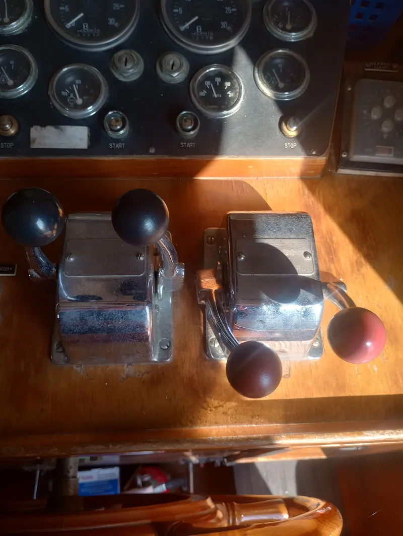 Slide: The Image of Control console of a 1981 Marine Trading 44 Double Cabin boat. - 49