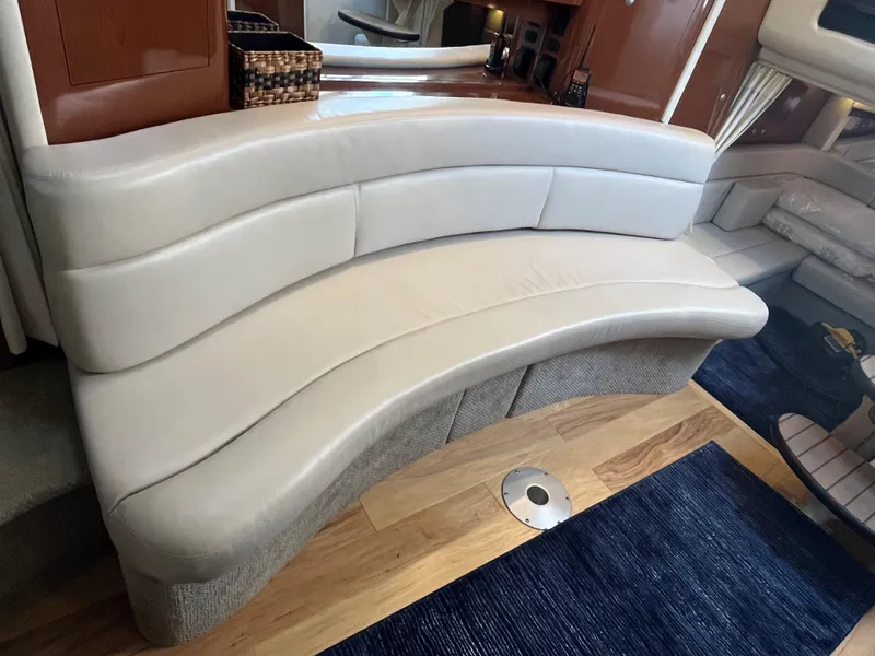 Slide: The Image of Luxurious interior of 2008 Sea Ray 340 Sundancer with curved leather seating. - 20