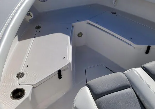 Slide: The Image of 2017 Everglades 255 Center Console boat interior with seating and storage compartments. - 12