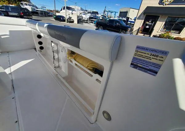 Slide: The Image of 2017 Everglades 255 Center Console boat interior with seating and storage compartments. - 14