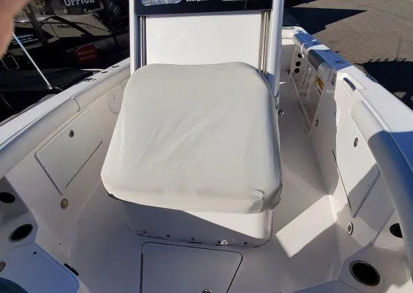 Slide: The Image of 2017 Everglades 255 Center Console boat interior with cushioned seating. - 18