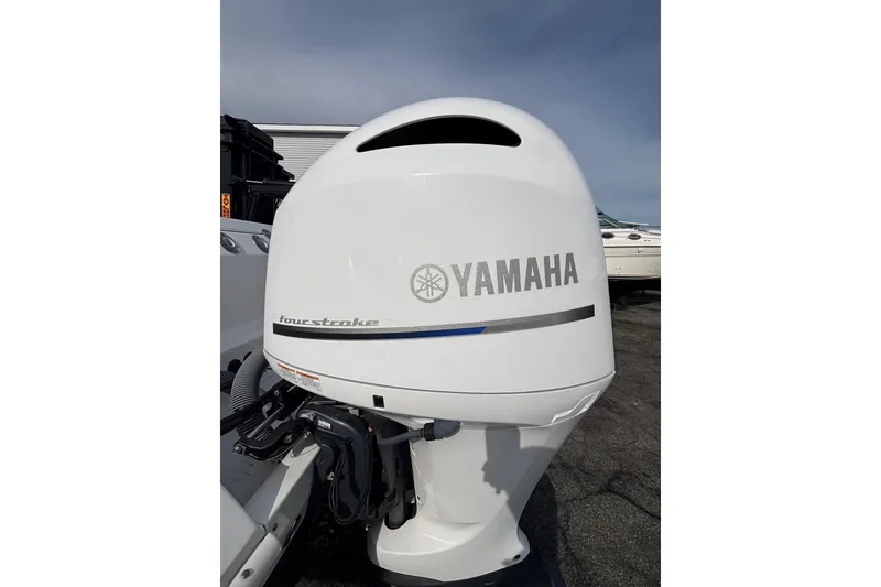 Slide: The Image of Yamaha four-stroke outboard motor on 2017 Everglades 255 Center Console boat. - 20
