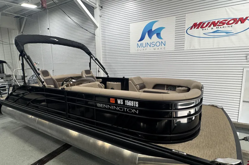 The Image of 2024 Bennington 24 L Swingback pontoon boat displayed indoors at Munson Ski & Marine. - 0