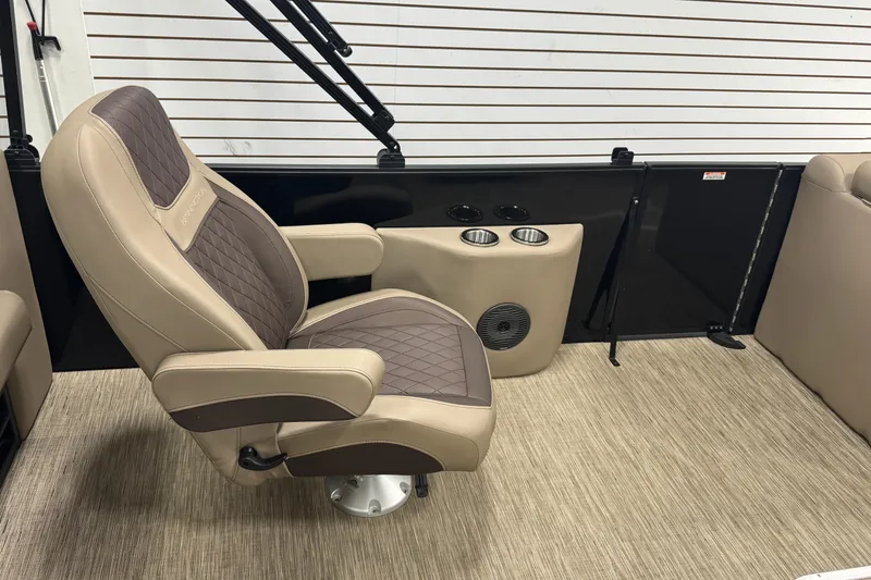 Slide: The Image of 2024 Bennington 24 L Swingback boat interior with luxurious seating and cup holders. - 17