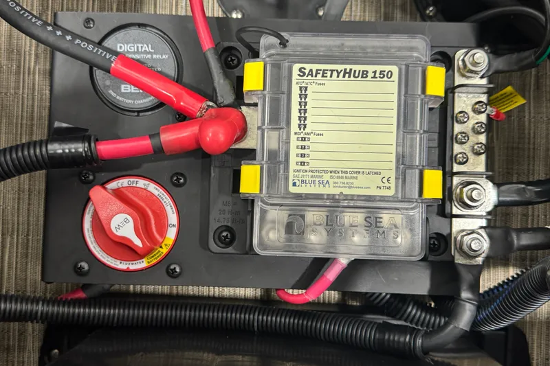 Slide: The Image of Electrical system of a 2024 Bennington 24 L Swingback with SafetyHub 150 and battery switch. - 24