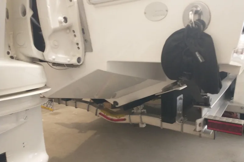 Slide: The Image of Rear view of a 2019 Concept 30' Open Deck boat on a trailer. - 10