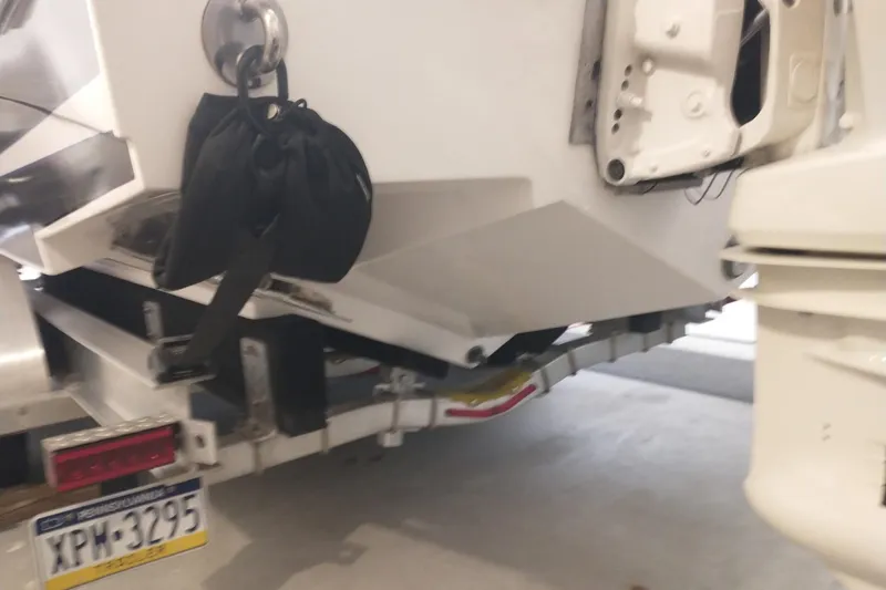 Slide: The Image of Rear view of a 2019 Concept 30' Open Deck boat on a trailer. - 11