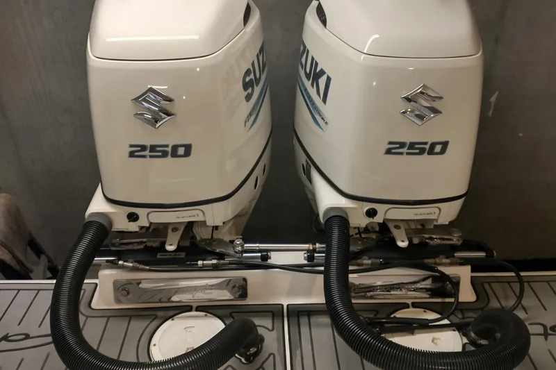Slide: The Image of Twin Suzuki 250 outboard motors on a 2019 Concept 30' Open Deck boat. - 14
