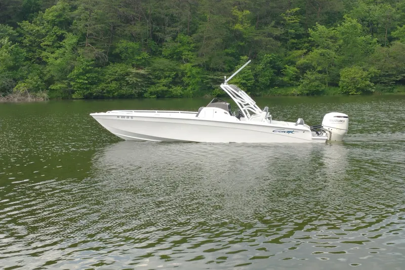 Slide: The Image of 2019 Concept 30' Open Deck boat cruising on a serene lake with lush green surroundings. - 21