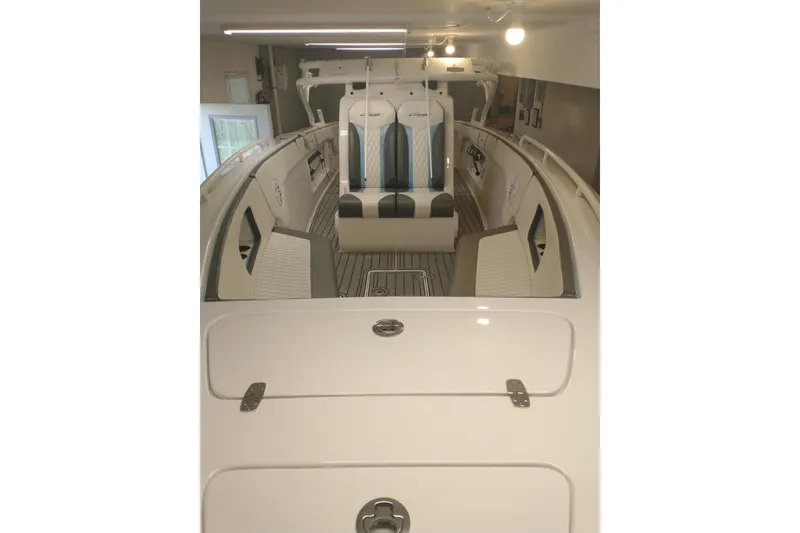Slide: The Image of 2019 Concept 30' Open Deck boat interior with sleek seating and modern design. - 22