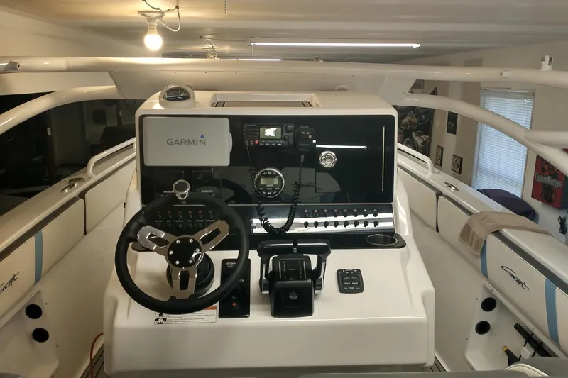 Slide: The Image of 2019 Concept 30' Open Deck boat cockpit with Garmin navigation system and modern controls. - 24