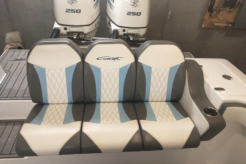 Slide: The Image of Three-tone seating on 2019 Concept 30' Open Deck boat with twin 250 engines. - 26