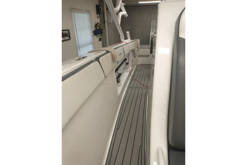 Slide: The Image of 2019 Concept 30' Open Deck boat interior with sleek seating and modern design. - 27