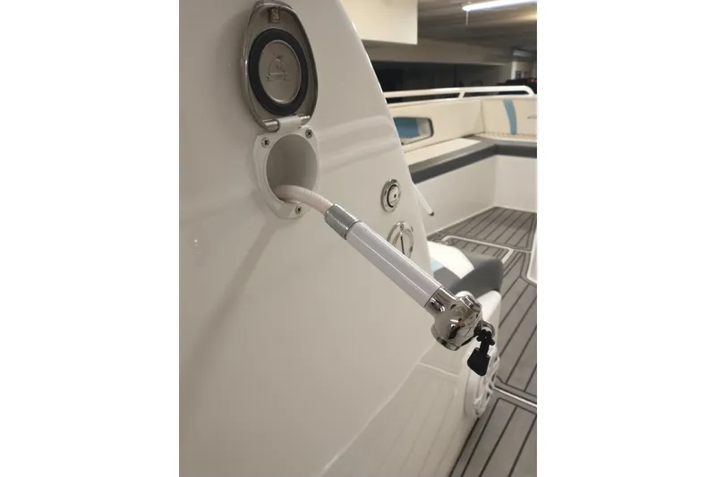 Slide: The Image of 2019 Concept 30' Open Deck boat interior with hose attachment. - 31