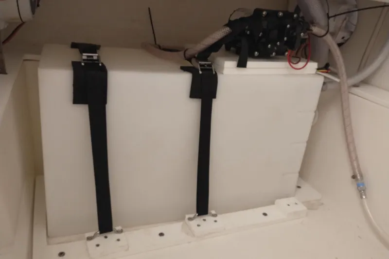 Slide: The Image of 2019 Concept 30' Open Deck boat storage compartment with secured equipment. - 34