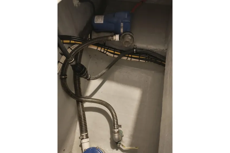 Slide: The Image of Bilge area of 2019 Concept 30' Open Deck boat with hoses and pump. - 35