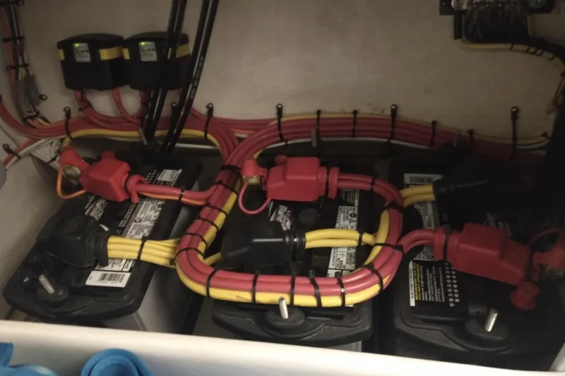 Slide: The Image of Battery compartment with wiring in a 2019 Concept 30' Open Deck boat. - 36