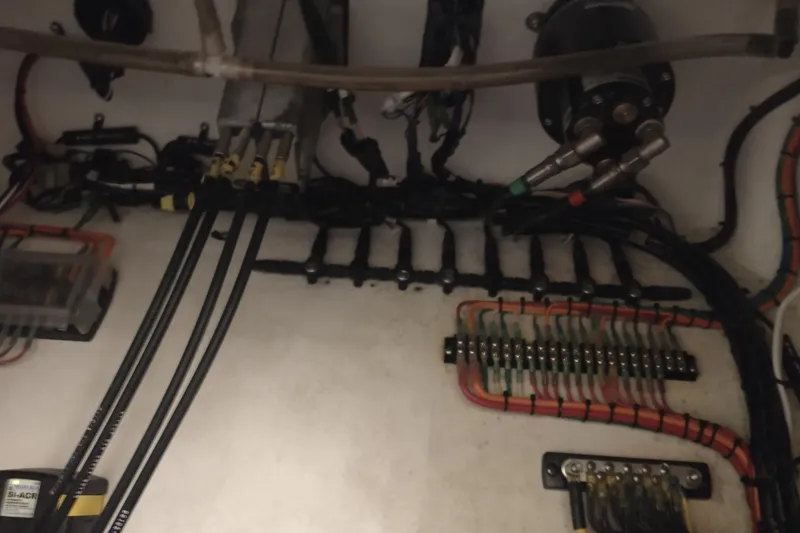 Slide: The Image of Electrical wiring and components inside a 2019 Concept 30' Open Deck boat. - 38