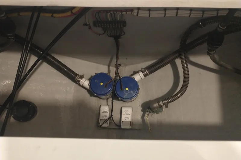 Slide: The Image of Boat wiring and plumbing components in a 2019 Concept 30' Open Deck. - 41