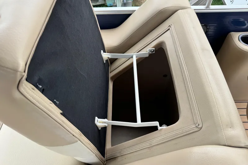 Slide: The Image of Open storage compartment in 2015 Harris FloteBote 220 Cruiser CX boat seat. - 18