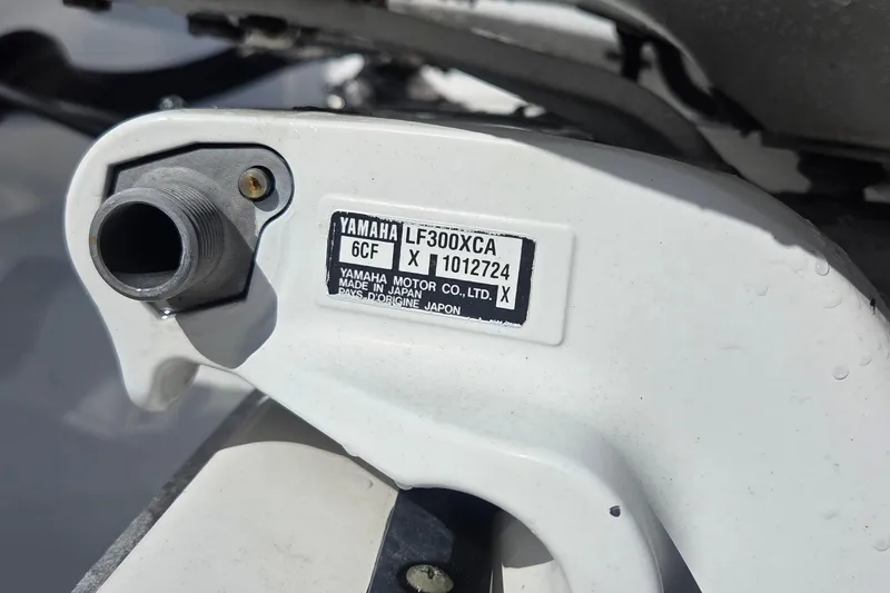 Slide: The Image of Close-up of Yamaha LF300XCA engine part on 2018 Edgewater 280CC boat. - 26