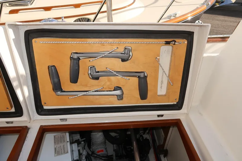 Slide: The Image of Storage compartment with tools on a 1999 Gozzard 37A sailboat. - 14