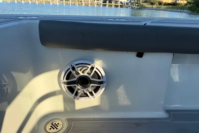 Slide: The Image of 2025 Caymas 281 HB boat interior with speaker and water view. - 24