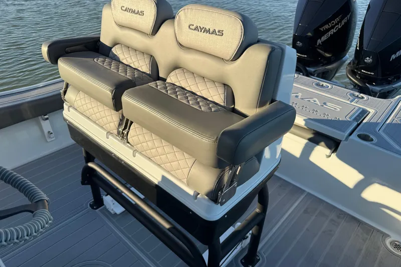 Slide: The Image of 2025 Caymas 281 HB boat with luxurious seating and dual Mercury engines. - 30