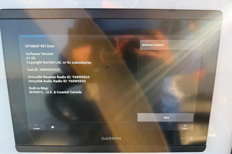 Slide: The Image of Garmin GPSMAP 8612xsv display on Caymas 281 HB, 2025 model, showing software information. - 40
